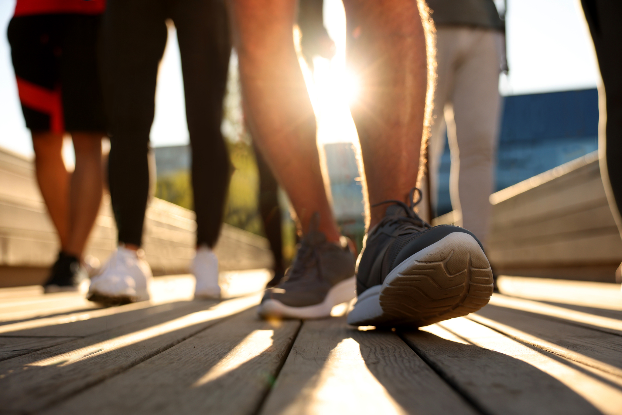 Close up of people's feet walking outdoors